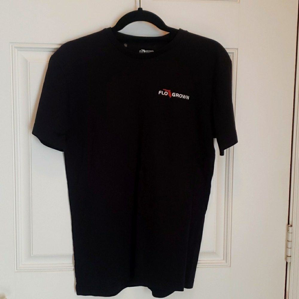 Flo Grown Short Sleeve black T with 4 wheel truck design on back